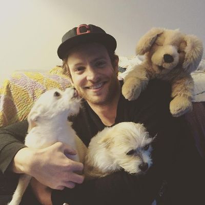 Nick Gehlfuss holding his two cute dogs. 